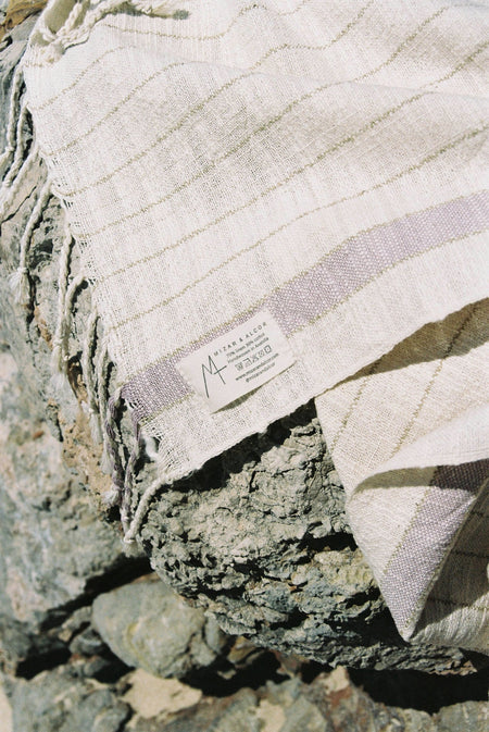 https://raelifestyle.com/cdn/shop/files/bahia-lavender-organic-cotton-linen-throw_1206x_6d949e24-f655-4707-984c-1e0a6905ff7b_450x673.jpg?v=1683918516